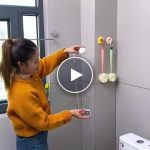 Podesiva vješalica – ne treba bušenje (2 komada) – video